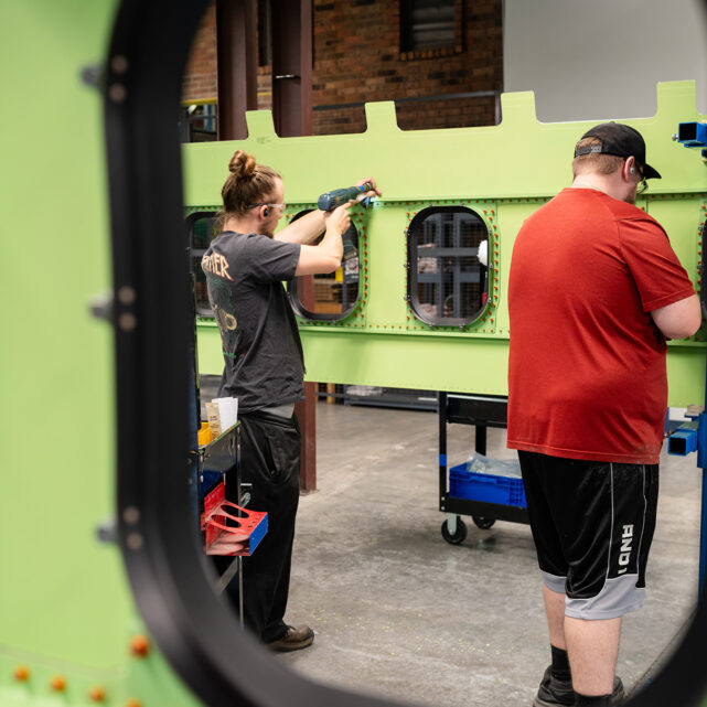 Employees doing Sheet Metal Fabrication